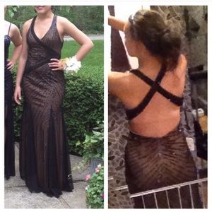 Black beaded prom dress with champagne underlay